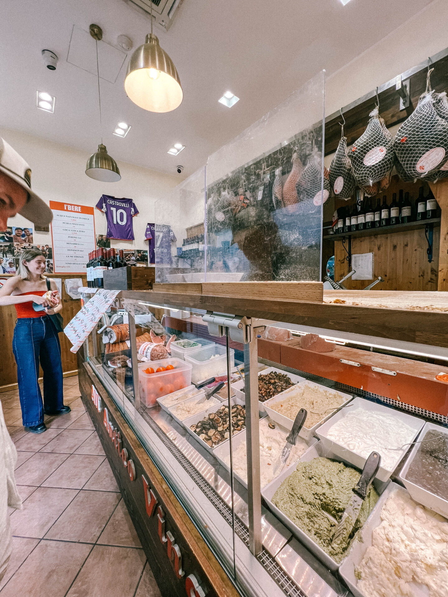 The famous sandwich shop and counter of All'Antico Vinaio located close to the Pantheon in Rome.