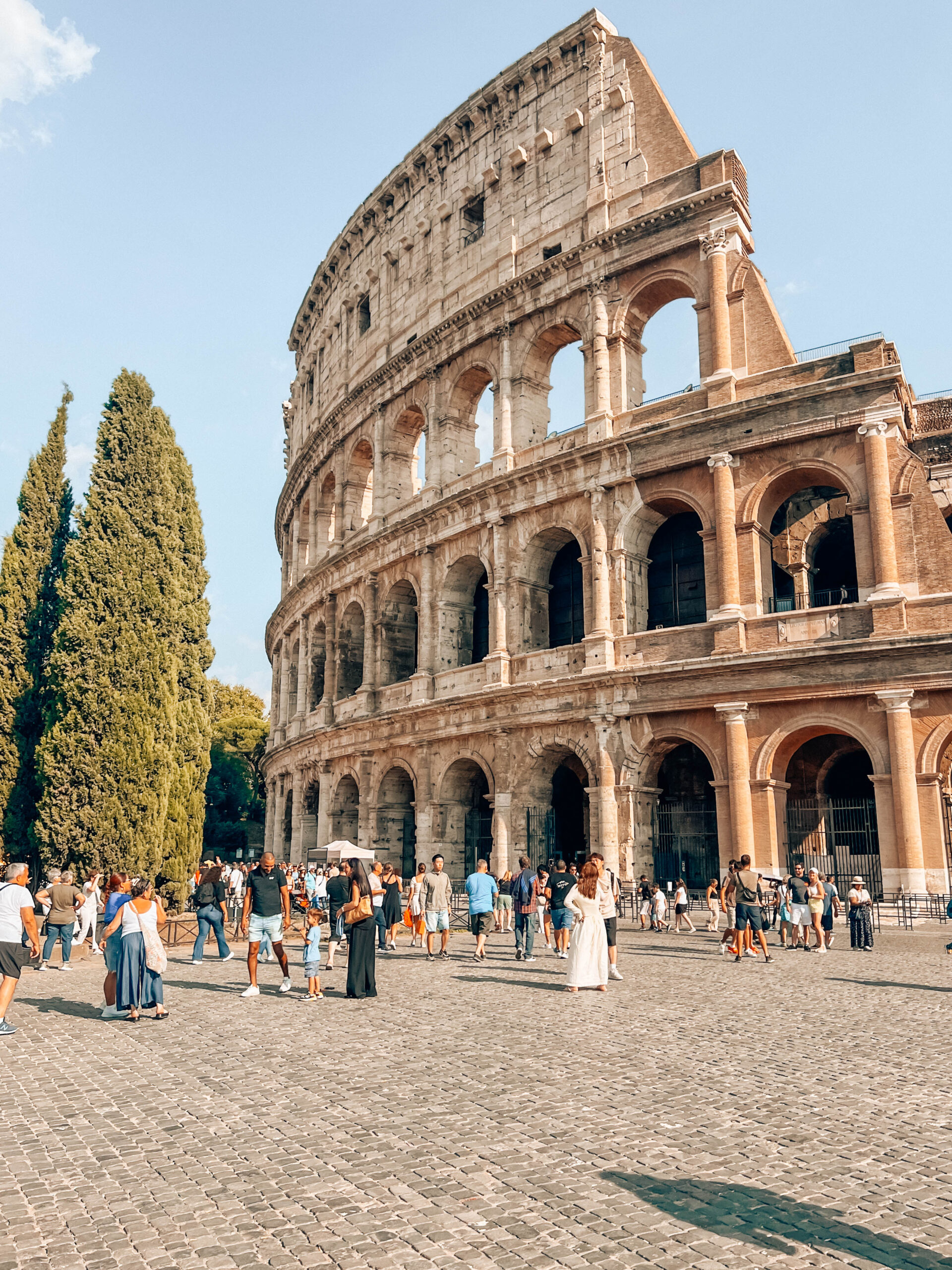 An outside view of the Roman Colosseum on a sunny day in October. 